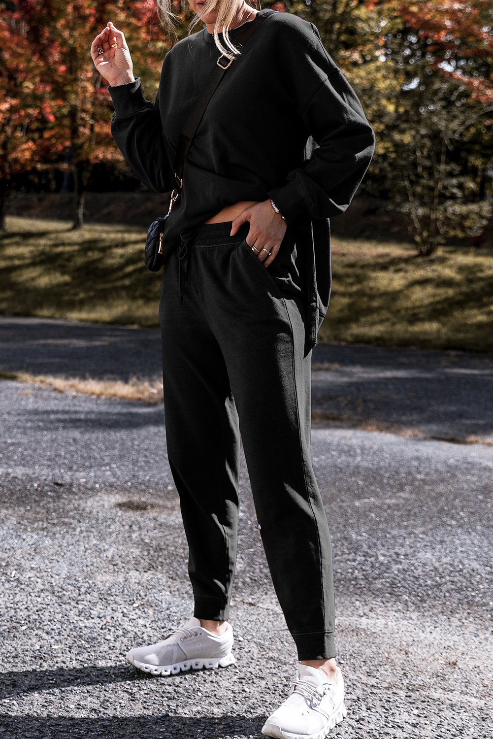 97027650-0c69faf462c8a98b.jpg black solid color high low pullover and skinny pants set