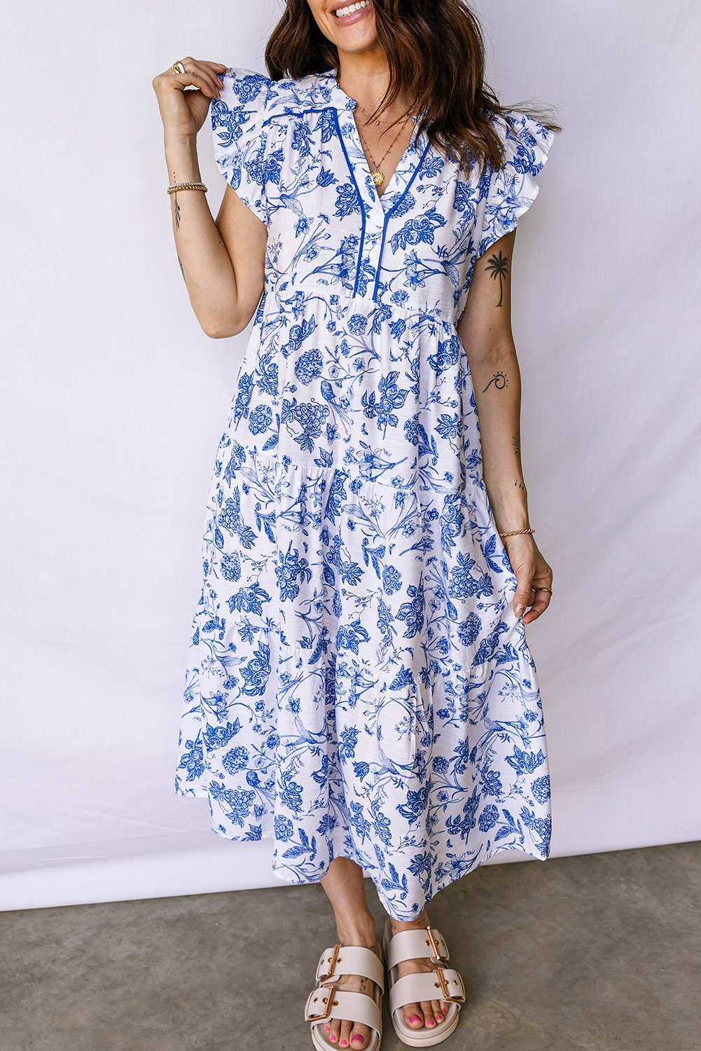 97026988-4d4d79120ff264f4.jpg blue ruffled short sleeve tiered floral midi dress