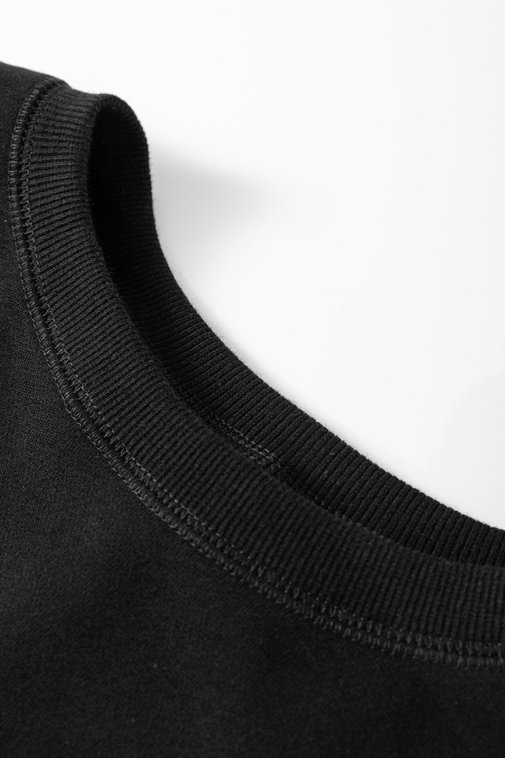 97027654-5fef6f2b2e0a838d.jpg black solid color high low pullover and skinny pants set