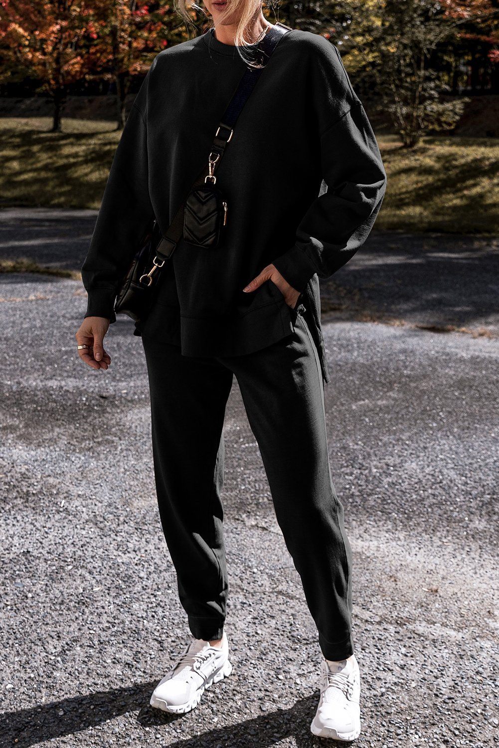 97027648-e09cc6187158ed34.jpg black solid color high low pullover and skinny pants set